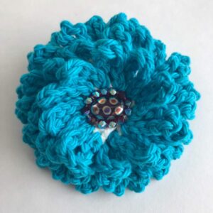 turquoise crocheted beaded flower brooch