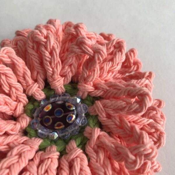 soft pink crocheted beaded flower brooch