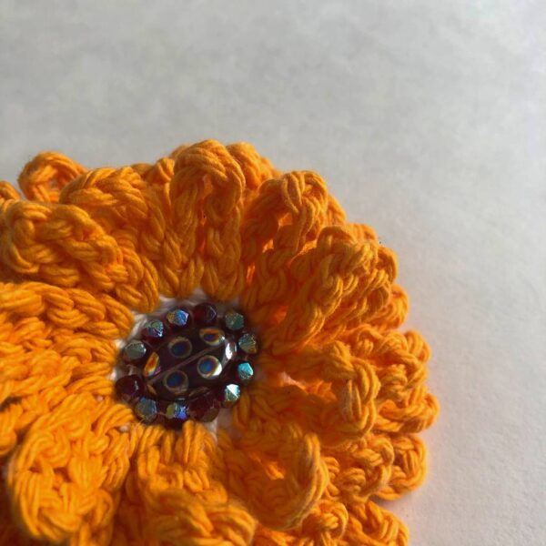 orange crocheted beaded flower brooch
