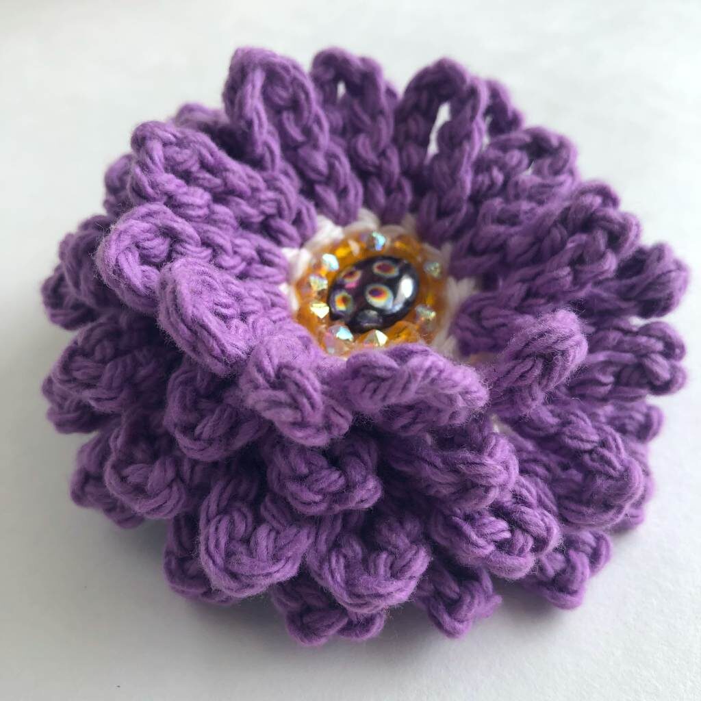 purple crocheted beaded flower brooch