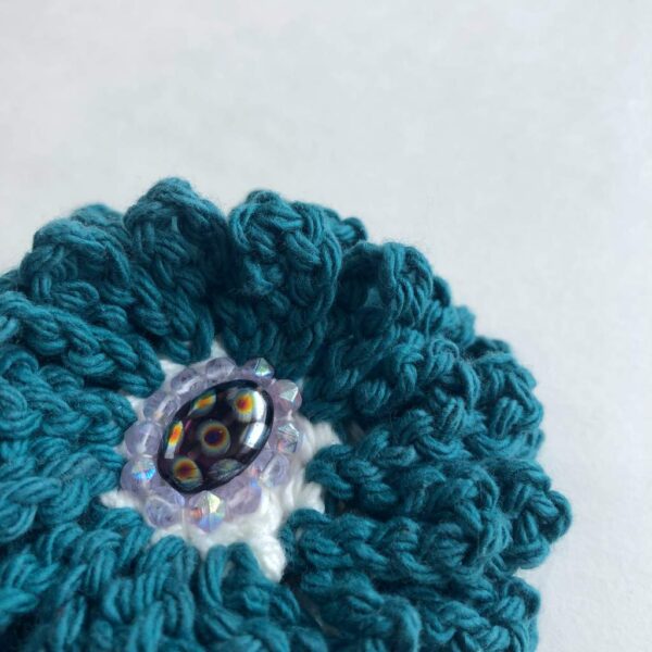 teal crocheted beaded flower brooch